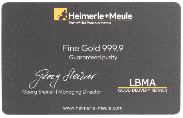 Rückseite Heimerle + Meule Secain Card mit 0,1g Feingold Barren Reinheit 999.9 in edler schwarzer Blisterkarte