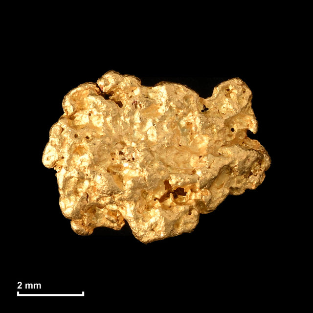 Goldnugget Nr. 26-0341 mit Maßstab: 6,9 × 5,2 mm bei 0,28 g