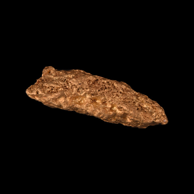 Goldnugget aus Leonora, Westaustralien, 0,63 g, Unikat Nr. 26-0210, freigestellt vor schwarzem Grund