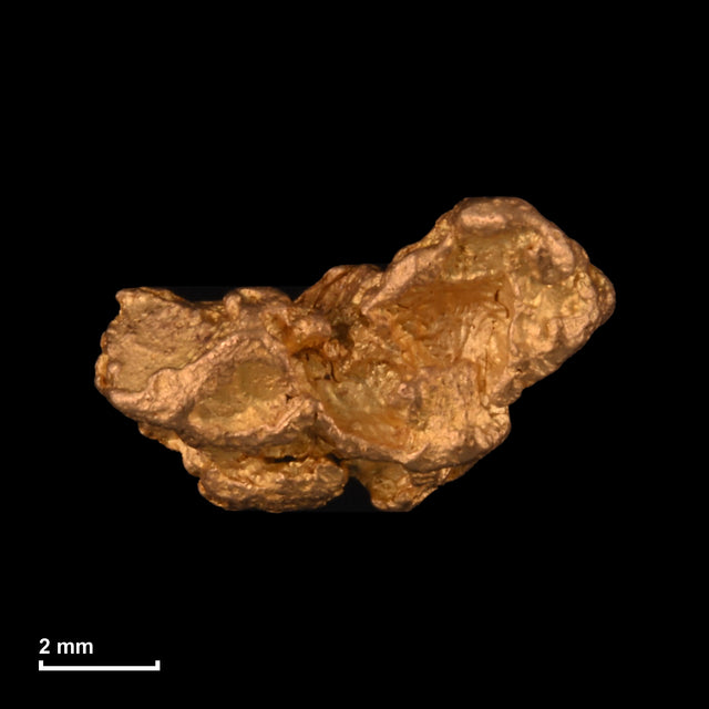 Goldnugget Nr. 26-0185 mit Maßstab: 8,6 × 5,2 mm bei 0,65 g