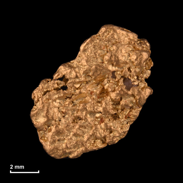 Goldnugget Nr. 26-0133 mit Maßstab: 9,2 × 8,5 mm bei 0,80 g