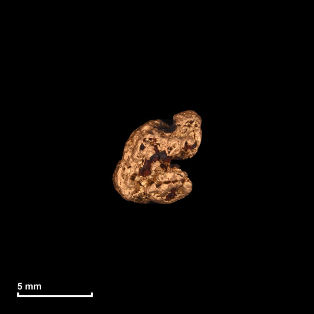 Goldnugget Nr. 26-0092 mit Maßstab: 6,2 × 5,9 mm bei 0,83 g
