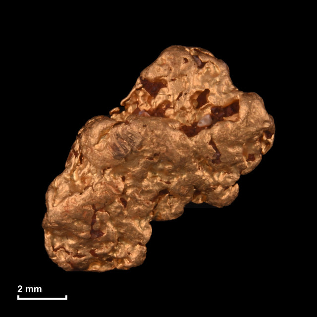 Goldnugget Nr. 26-0159 mit Maßstab: 9,4 × 9,1 mm bei 1,18 g