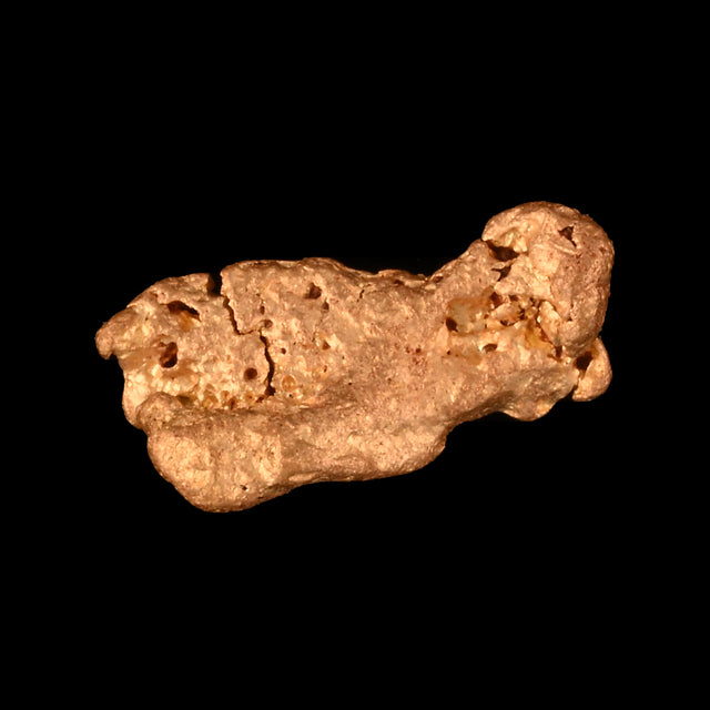 Goldnugget aus Leonora, Westaustralien, 0,49 g, Unikat Nr. 26-0329, freigestellt vor schwarzem Grund