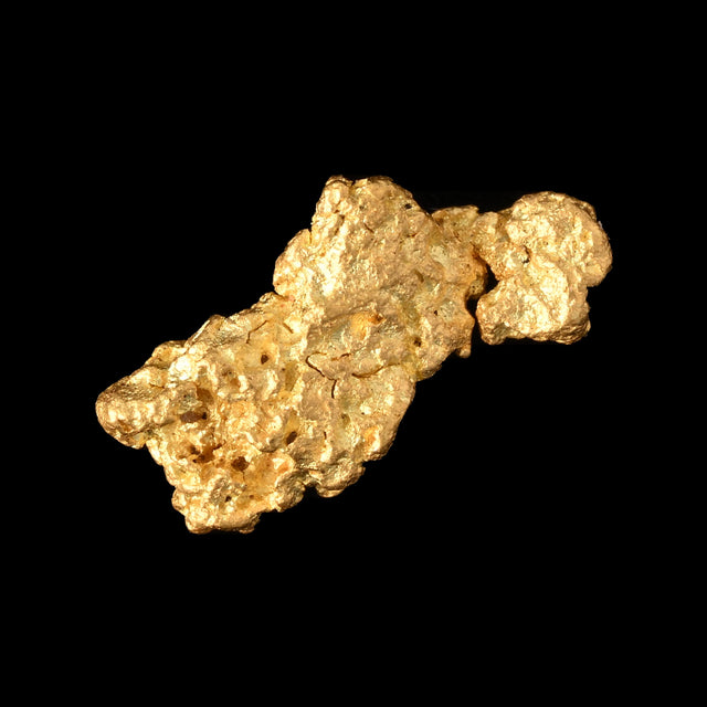 Goldnugget aus Leonora, Westaustralien, 0,57 g, Unikat Nr. 26-0058, freigestellt vor schwarzem Grund