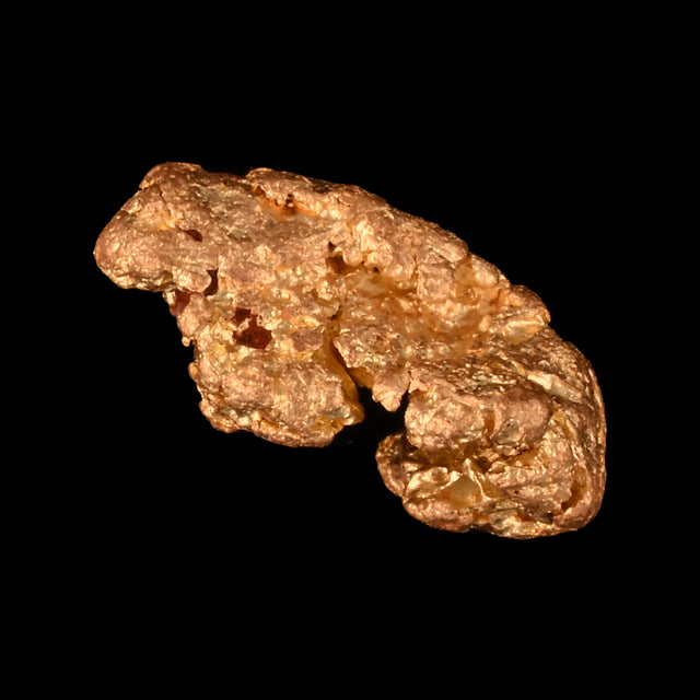 Goldnugget aus Leonora, Westaustralien, 0,57 g, Unikat Nr. 26-0333, freigestellt vor schwarzem Grund