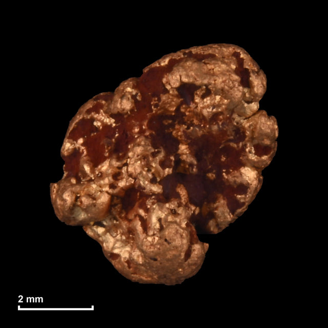 Goldnugget Nr. 26-0146 mit Maßstab: 6,4 × 6,0 mm bei 0,84 g