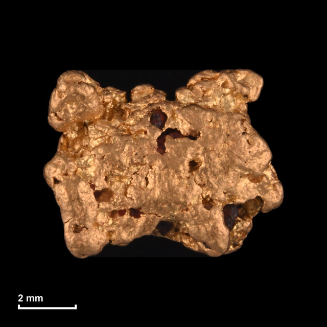 Goldnugget Nr. 26-0127 mit Maßstab: 8,2 × 6,4 mm bei 0,93 g