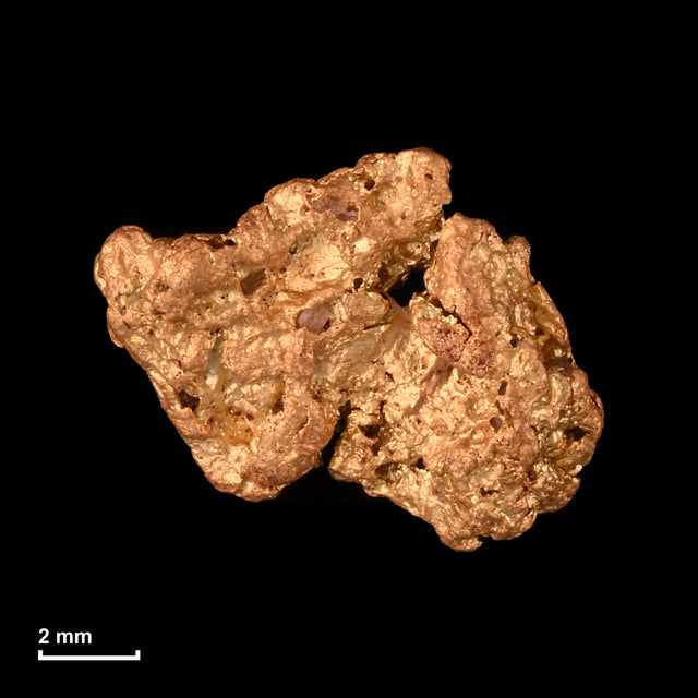 Goldnugget Nr. 26-0325 mit Maßstab: 10,1 × 8,0 mm bei 1,03 g