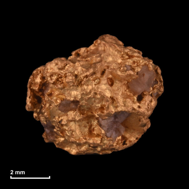 Goldnugget Nr. 26-0162 mit Maßstab: 7,0 × 6,1 mm bei 1,34 g